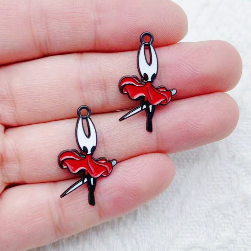 10 pendentifs en alliage motif - Party Games Crazy avis et prix