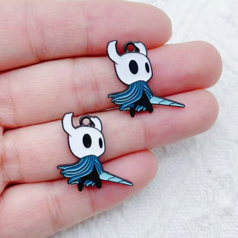 10 pendentifs en alliage motif - Party Games Crazy avis et prix